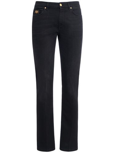 Jeans In Denim Di Cotone Stonewashed - VERSACE - Modalova