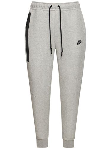 Pantaloni Jogger Slim Fit In Techno Pile - NIKE - Modalova