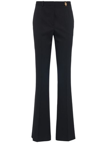 Stretch Virgin Wool Mid Rise Flare Pants - VERSACE - Modalova