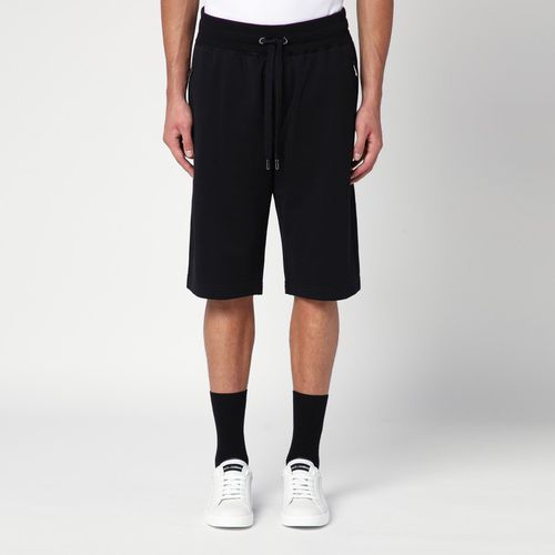 Jogging bermuda shorts with logo plaque - Dolce&Gabbana - Modalova