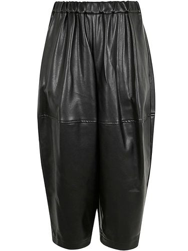 Pleated Tapered Leg Trousers - Comme des Garçons - Modalova