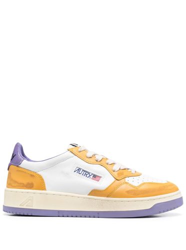 Color-block Yellow And Purple medalist Low Top Sneakers In Cow Leather - Autry - Modalova