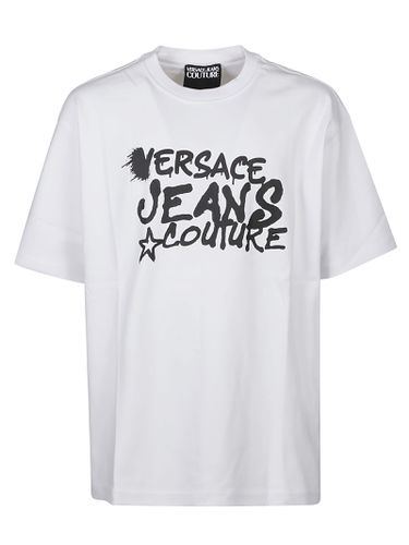 Logo Dripping T-shirt - Versace Jeans Couture - Modalova