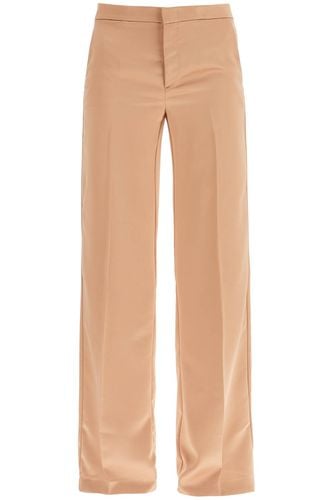 The Andamane Flared Satin Trousers - The Andamane - Modalova