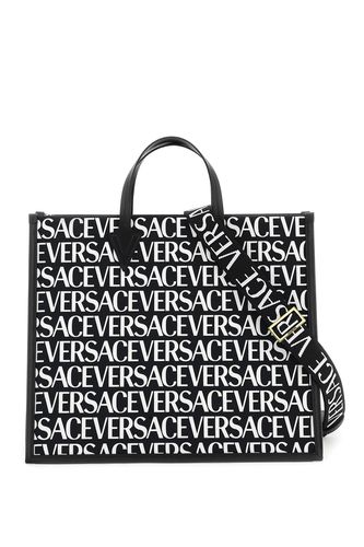 Versace Tote Bag With All-over Logo - Versace - Modalova