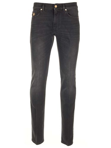 Stretch Denim Slim Fit Jeans - Versace - Modalova