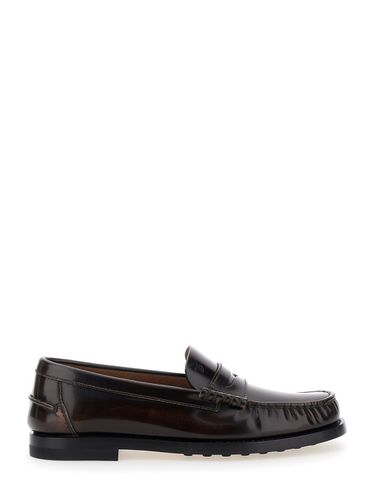 Loafers With Embossed Monogram In Leather Woman - Tod's - Modalova