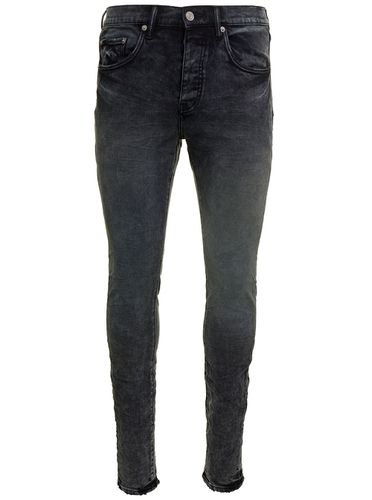 Skinny Jeans With Tonal Logo Patch And Crinkled Effect In Stretch Cotton Denim Man - Purple Brand - Modalova