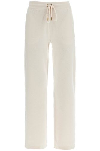 Versace Flared Knit Pants For Women - Versace - Modalova