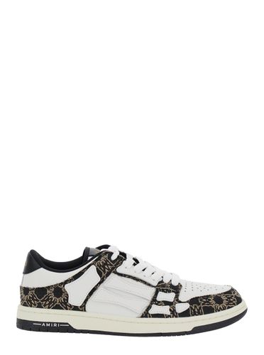 Skel Top Low Sneaker With Skeleton Applications And All-over Logo Print In Leather Man - AMIRI - Modalova