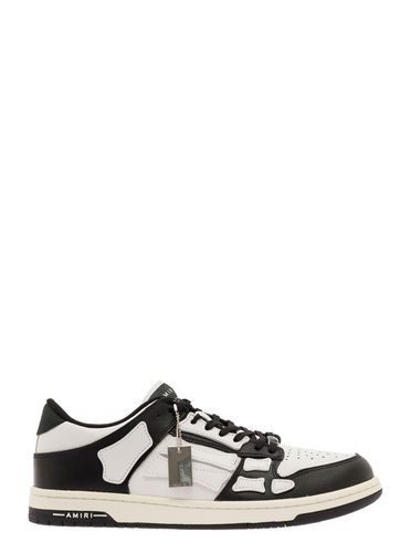 Skel Top Low And Black Sneakers With Skeleton Patch In Leather Man - AMIRI - Modalova