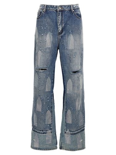 Rhinestone Washed Denim Jeans - Who Decides War - Modalova