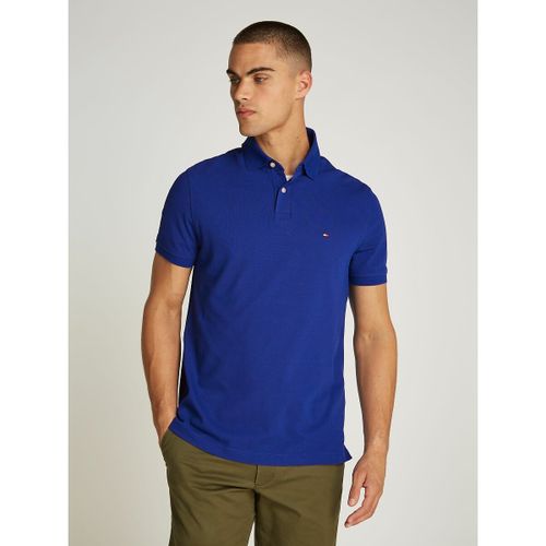 Polo dritta stretch 2 bottoni al collo - TOMMY HILFIGER - Modalova