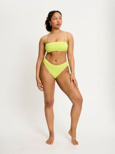 SmileyWorld Modibodi Cheeky Brief Moderate-Heavy Acid Yellow - Modibodi - Modalova