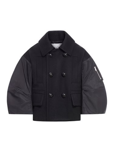 Double-breasted jacket with nylon sleeves - Woman - Sacai - Modalova