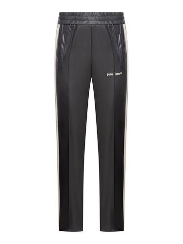 Sports trousers with embroidery - Man - Palm Angels - Modalova