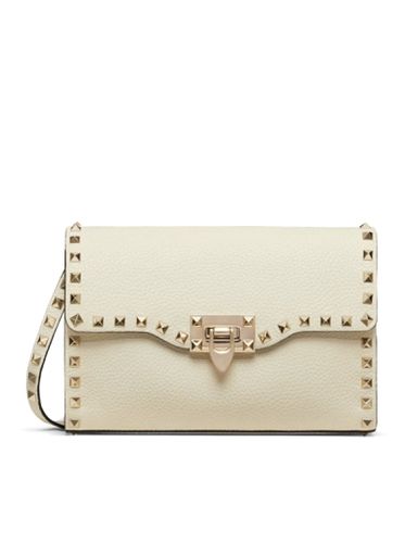 SMALL ROCKSTUD CROSSBODY BAG IN GARNET CALFSKIN - Woman - Valentino Garavani - Modalova