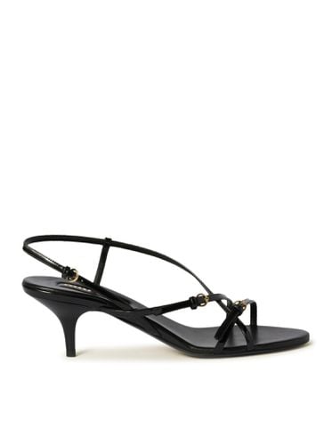 Patent leather sandals with buckles - Woman - Miu Miu - Modalova