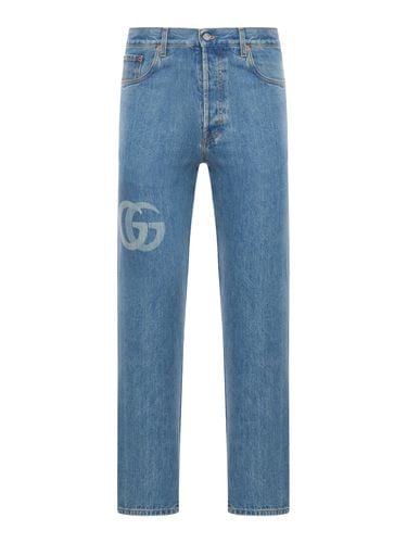 DENIM PANTS WITH LASER-CUT DOUBLE G - Man - Gucci - Modalova