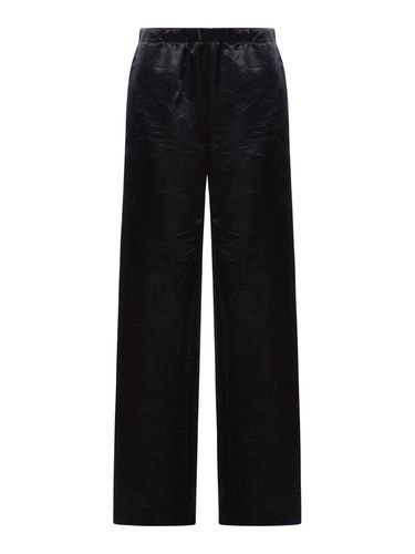 VISCOSE TROUSERS WITH WRINKLED EFFECT - Woman - Givenchy - Modalova