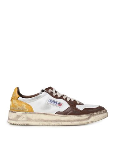 Sneakers in leather with used effect - - Man - Autry - Modalova