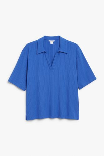 Kurzärmeliges blaues Oversized-Poloshirt Blau, Poloshirts in Größe XS. Farbe: - Monki - Modalova