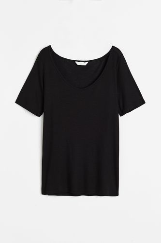 T-Shirt aus Lyocell Schwarz in Größe S. Farbe: - H&M - Modalova