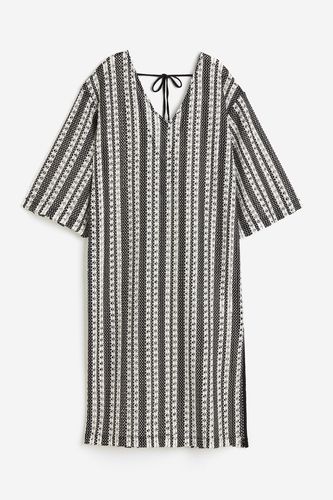 Kleid aus Jacquardstrick Schwarz/Gestreift, Alltagskleider in Größe XL. Farbe: - H&M - Modalova