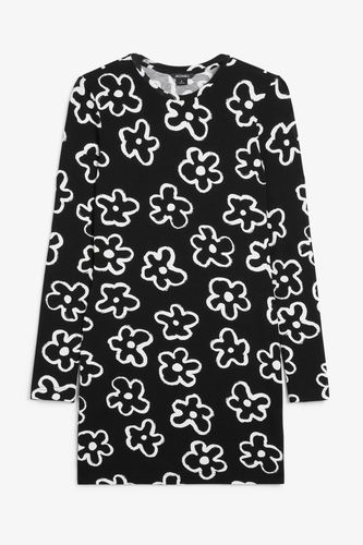 Langärmeliges Jersey-Minikleid Schwarz mit weißen Blumen, Alltagskleider in Größe M. Farbe: - Monki - Modalova
