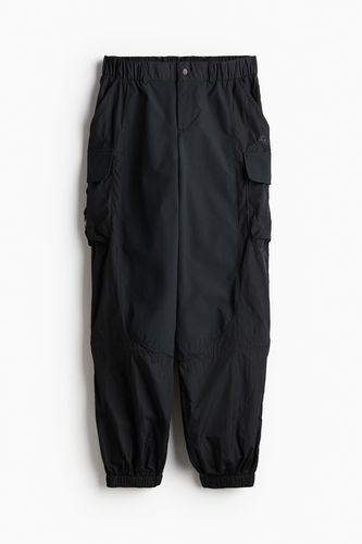 Wasserabweisende Hiking-Hose Schwarz, Funktionskleidung – Hosen in Größe L. Farbe: - H&M - Modalova