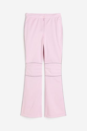 Wasserabweisende ausgestellte Hose Hellrosa, Funktionskleidung – Hosen in Größe 48. Farbe: - H&M - Modalova