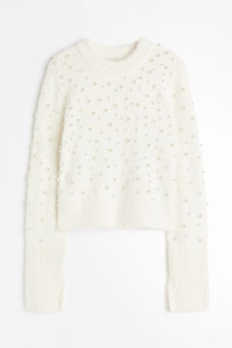 Pullover mit Perlenverzierung Cremefarben in Größe M. Farbe: - H&M - Modalova