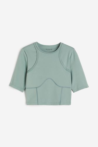 DryMove™ Sportshirt mit Cut-out im Rücken Helles Blaugrün, Sport – T-Shirts in Größe XS. Farbe: - H&M - Modalova