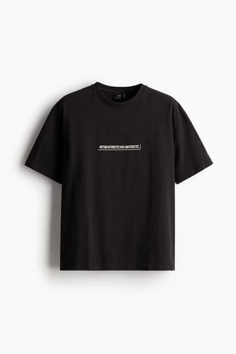 Bedrucktes T-Shirt in Loose Fit Schwarz/Interested Größe L. Farbe: - H&M - Modalova