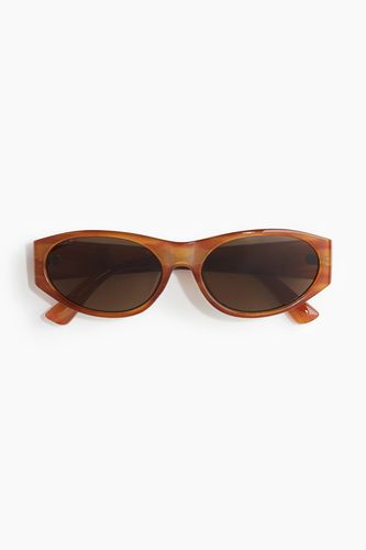 Ovale Sonnenbrille Braun, Sonnenbrillen in Größe Onesize. Farbe: - H&M - Modalova