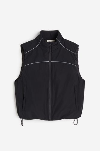 Wasserabweisende wattierte Laufweste Schwarz, Sportjacken in Größe XL. Farbe: - H&M - Modalova