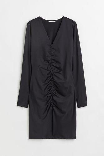 Kleid mit Raffung Schwarz, Alltagskleider in Größe L. Farbe: - H&M - Modalova
