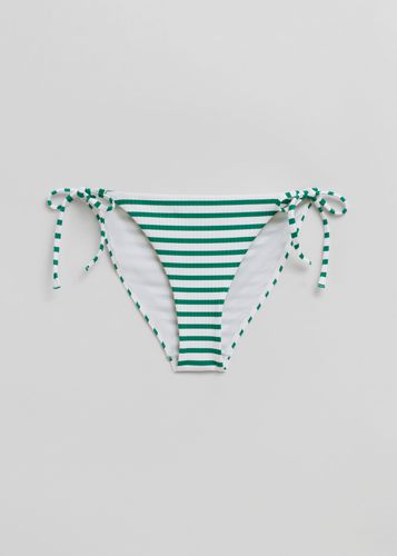 Bikinihose mit seitlichen Bindebändern Grün/Weißgelb, Bikini-Unterteil in Größe 44. Farbe: - & Other Stories - Modalova