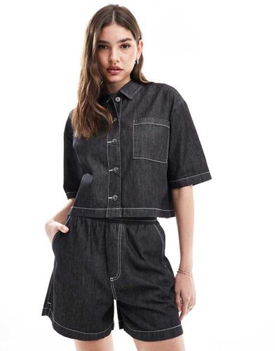 Camicia in denim oversize leggera a maniche corte con cuciture a contrasto in coordinato - Collusion - Modalova