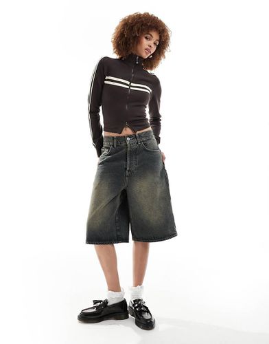 Pantaloncini di jeans ampi stile skater dirty wash - Collusion - Modalova