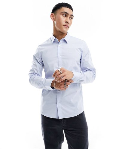 Camicia slim in popeline elasticizzato color azzurro - Calvin Klein - Modalova