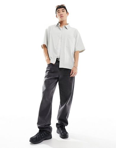 Camicia a maniche corte grigia con etichetta cucita - Calvin Klein Jeans - Modalova