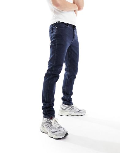 Jeans slim affusolati lavaggio scuro - Calvin Klein Jeans - Modalova