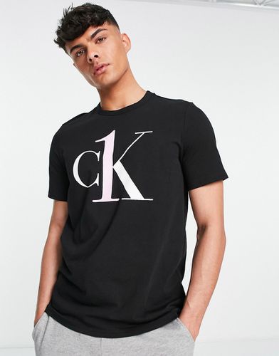 T-shirt girocollo nera da casa con logo "CK One" - Calvin Klein - Modalova