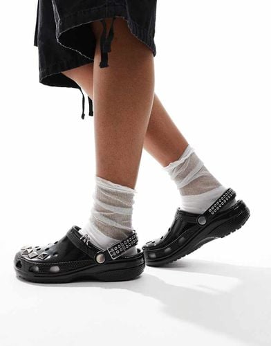 Zoccoli classici neri con borchie - Crocs - Modalova