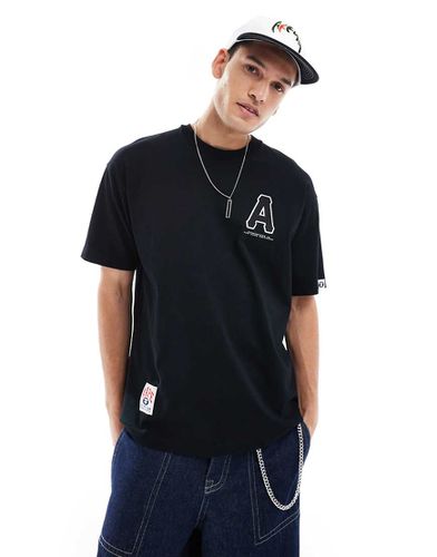 Aape by A Bathing Ape - T-shirt nera con stampa del logo sul retro - AAPE BY A BATHING APE® - Modalova