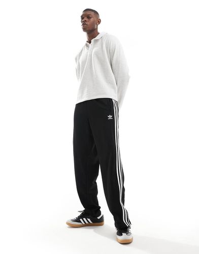 Firebird - Pantaloni sportivi neri - adidas Originals - Modalova