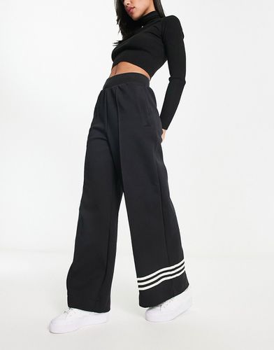 Neuclassics - Pantaloni con fondo ampio neri - adidas Originals - Modalova