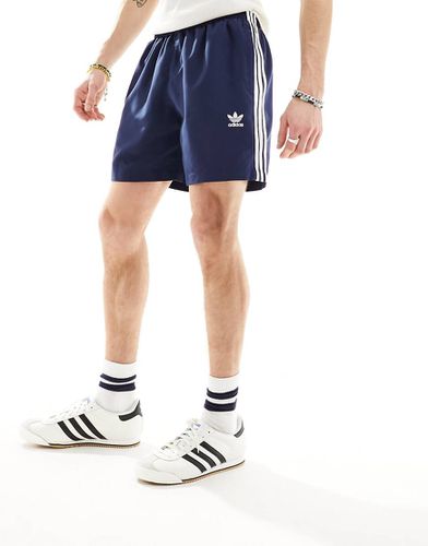 Pantaloncini da bagno con tre strisce e trifoglio - adidas Originals - Modalova