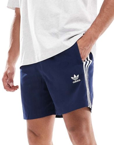 Pantaloncini da bagno con tre strisce e trifoglio - adidas Originals - Modalova